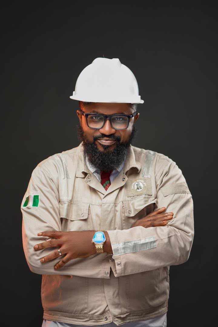 HADILO founding director in Nigerian coveralls and hard hat